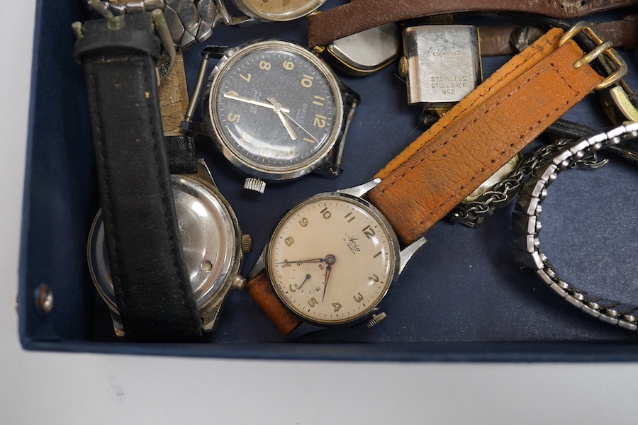 A group of eleven assorted lady's and gentleman's wrist watches including a steel Timex automatic, two steel Avia manual wind wrist watches and a steel Cyma Triplex Cymaflex manual wind wrist watch. Condition - poor to f